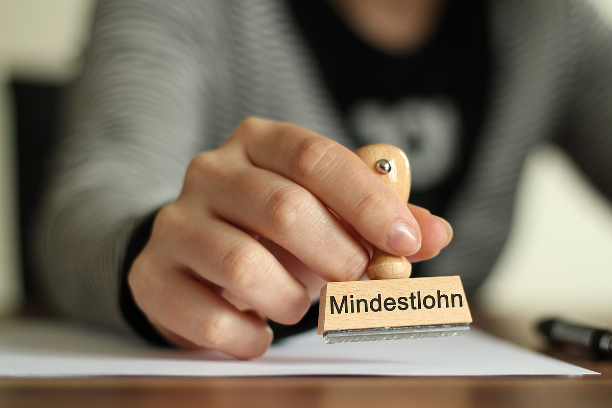 Stempel mit Mindestlohn beschriftet