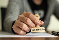 Stempel mit Mindestlohn beschriftet